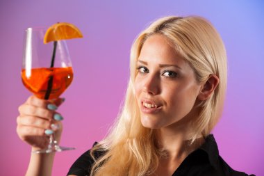 Beautiful young woman drinking aperol spritz clipart