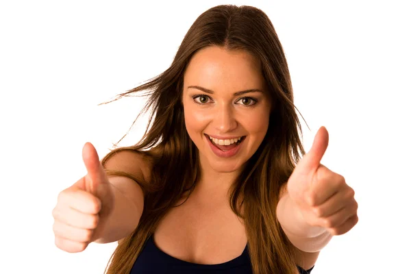 Beautiful asian caucasian woman gesturing success showing thumb — Stock Photo, Image