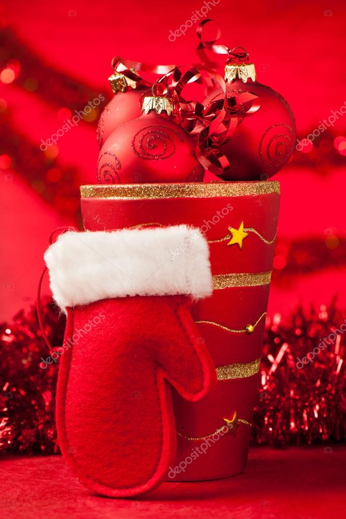 Christmas Ornaments In A Vase With Red Santa Claus Glove Stock