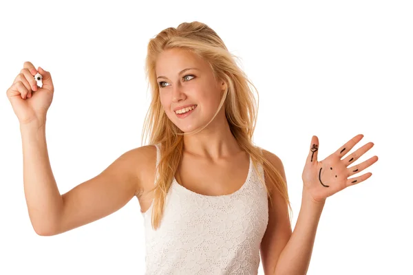 Jonge blonde zakenvrouw met blauwe ogen, schrijft over een glas ta — Stockfoto