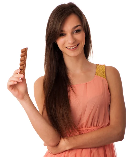 Beautiful young caucasian woman eating chocolate — Stock Photo, Image