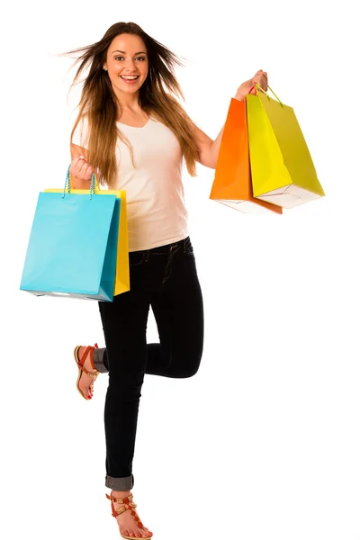 Preety jeune femme avec des sacs à provisions colorés isolés sur whi — Photo