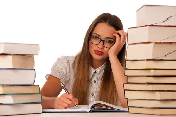 Stressed asian caucasian woman student learning in tons of books — Stock Photo, Image