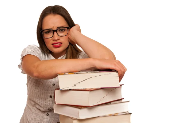 Stressed asian caucasian woman student learning in tons of books — Stock Photo, Image