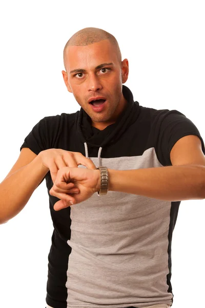 Νεαρός άνδρας χειρονομία είναι αργά παρακολουθώντας ρολόι απομονωθεί πάνω από whi — Φωτογραφία Αρχείου