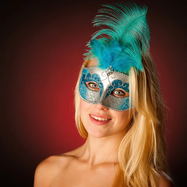 Cute blonde woman with venice mask on her face glamorous portrai — Stock Photo, Image