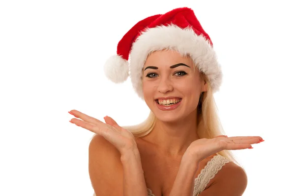 Santa claus şapka ile sarışın kadın — Stok fotoğraf