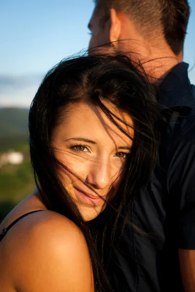 Teenage couple on a late summer afternoon in park — Stock Photo, Image