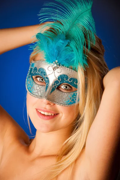 Cute blonde woman with venice mask on her face glamorous portrai — Stock Photo, Image