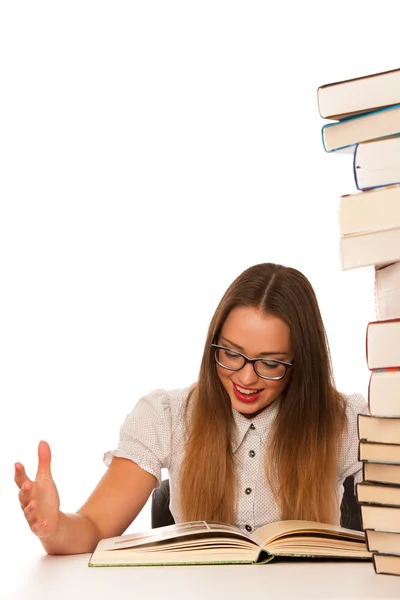 Happy asian caucasian girl lerning in study woth lots of books o — Stock Photo, Image