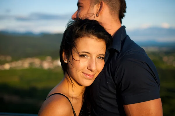 Teenage couple on a late summer afternoon in park — Stock Photo, Image