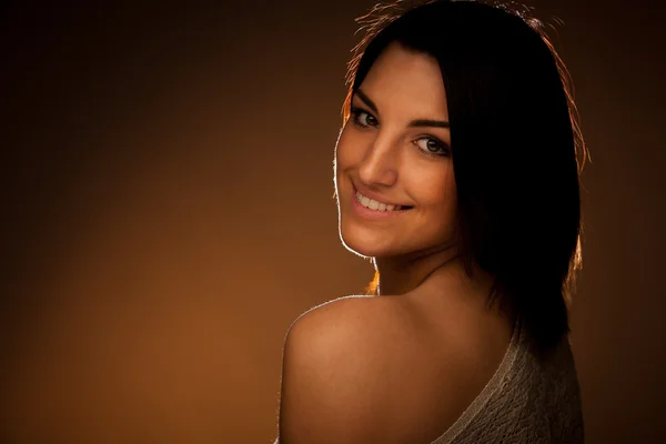 Studio portrait of beautiful young caucasian woman with brown ha — Stock Photo, Image