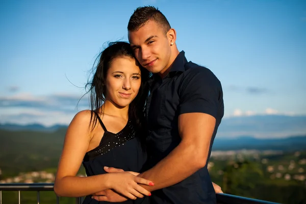 Teenage couple on a late summer afternoon in park — Stock Photo, Image