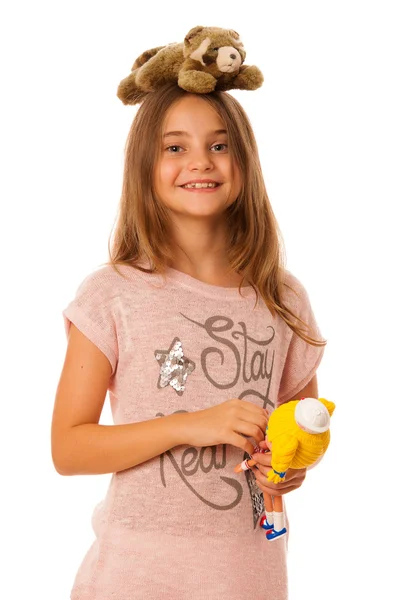 Menina com brinquedos isolados ovwer fundo branco — Fotografia de Stock