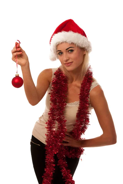 Blonde Frau mit Weihnachtsmann-Hut — Stockfoto