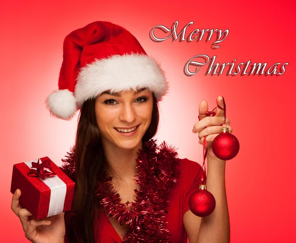 Giovane donna glamour con cappello Babbo Natale invio migliori auguri per Natale — Foto Stock