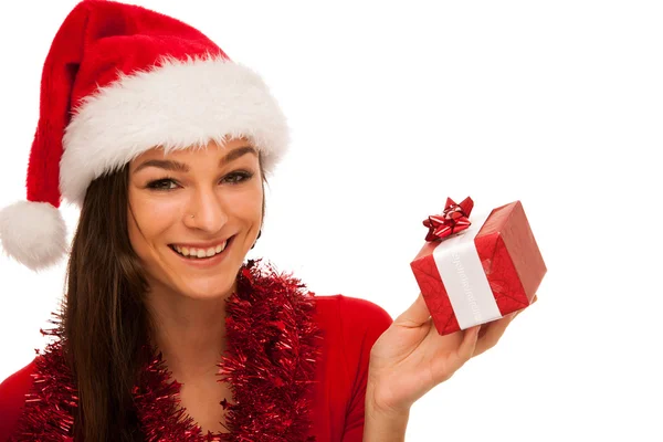 Glamorösa ung kvinna med jultomten hatt skicka bästa lyckönskningar för jul — Stockfoto