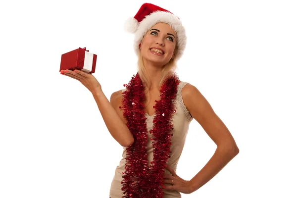 Blond kvinna med jultomten hatt — Stockfoto