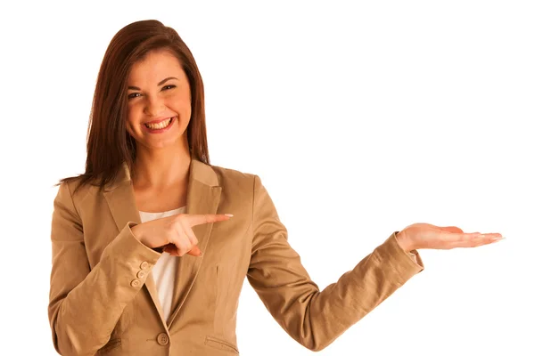 Beautiful young business woman pointing into copy space isolated — Stock Photo, Image