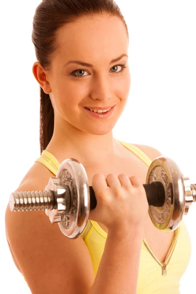 Hermosa joven haciendo ejercicio con maniquíes en el gimnasio de fitness —  Fotos de Stock