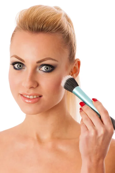 Portrait of woman holding beauty accessories, mascara, pauder br — Stock Photo, Image