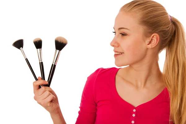 Žena s kosmetické štětce pro make-up, samostatný. — Stock fotografie