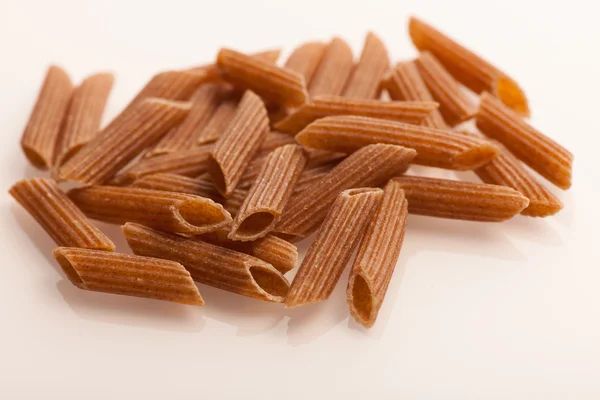 Bunch of pasta made of buckwheat flour isolated over white background — Stock Photo, Image