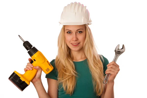 Mujer con casco de constructor y herramientas felices de hacer un trabajo duro . —  Fotos de Stock