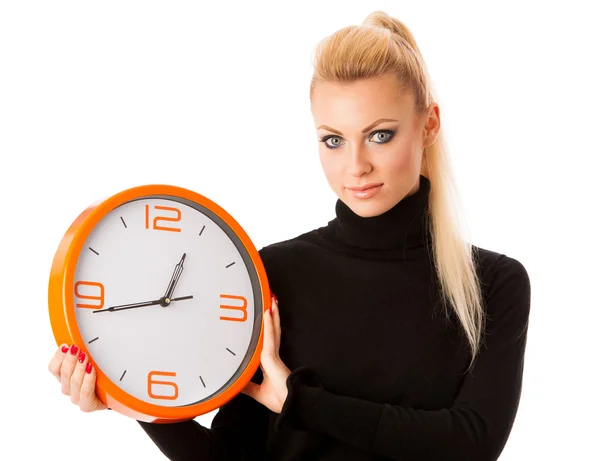 Calme femme souriante avec grande horloge orange geste sans précipitation, enou — Photo