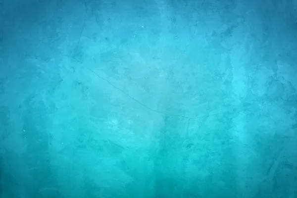 Lekeli, çatallı, lekeli eski bir turkuaz duvar. Soyut grunge tarzında boyanmış beton duvar. Grunge arkaplan dokusu arka plan, portreler, posterler.