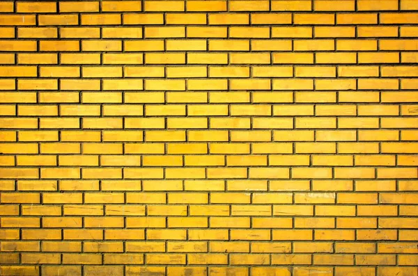 Yıpranmış eski sarı tuğla duvar arka planı
