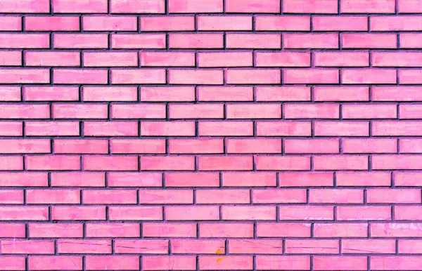 風化した古いピンクのレンガの壁の背景 — ストック写真