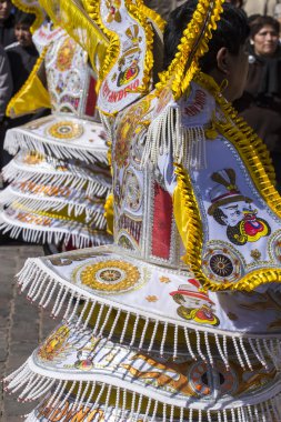 CUSCO - PERU - JUNE 06, 2016 : Peruvian dancers at the parade in clipart