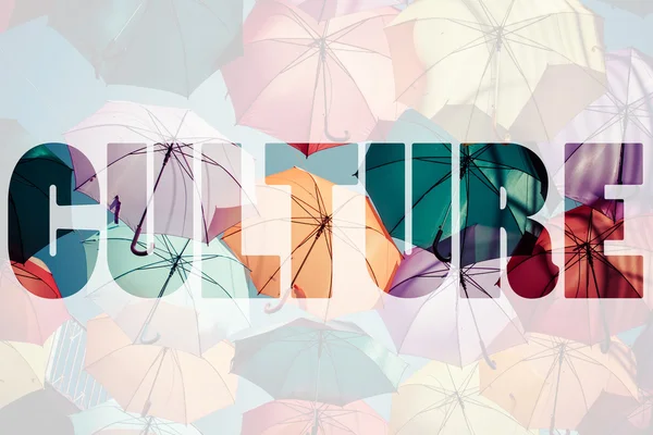 Word CULTURE over colorful umbrellas. — Stock Photo, Image