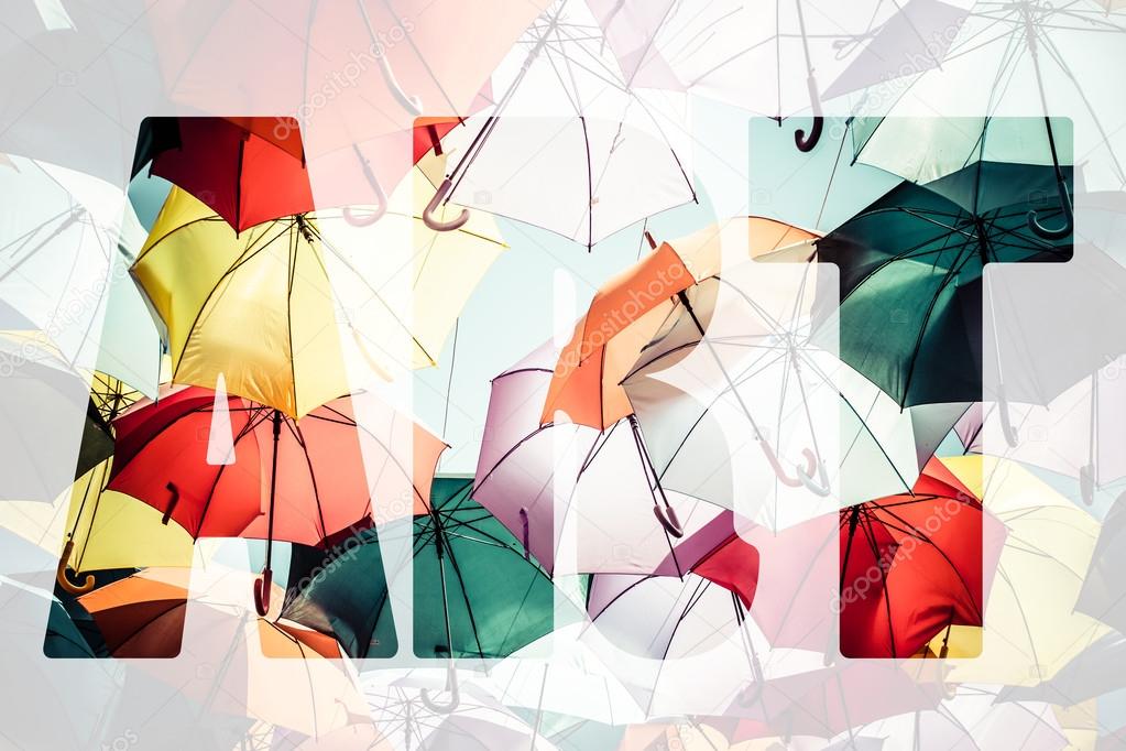 Word ART over colorful umbrellas. Stock Photo by ©Curioso_Travel
