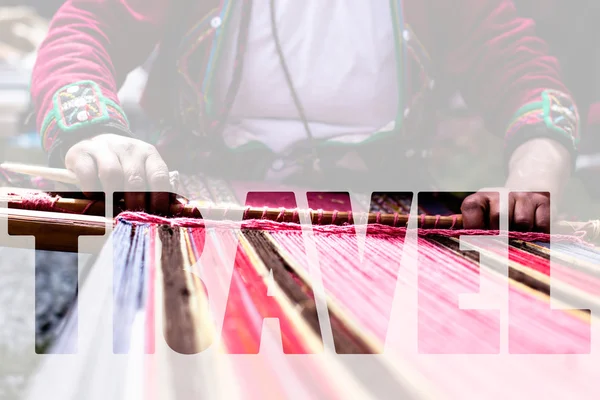 Word TRAVEL over Traditional hand weaving in the Andes Mountains