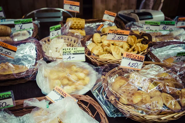 Traditional polish smoked cheese oscypek on outdoor market in Za