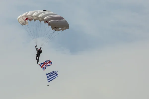 RADOM, POLAND - AUGUST 23: Parachutist with the diferent flags a — Stock Photo, Image