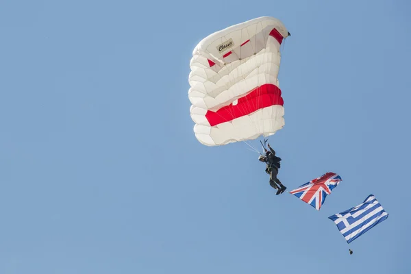 RADOM, POLAND - AUGUST 23: Parachutist with the diferent flags a — Stock Photo, Image