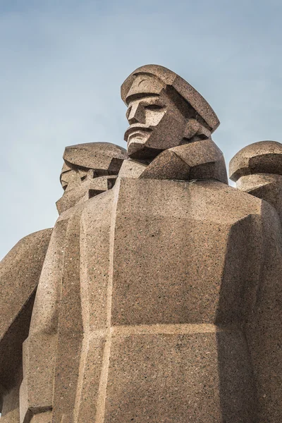 Soviet era monument for the Latvian Riflemen. Latvian Riflemen w — Stock Photo, Image