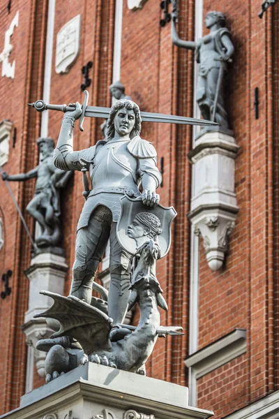Boy with the sword and dragon; an architectural detail of the Ho — Stock Photo, Image