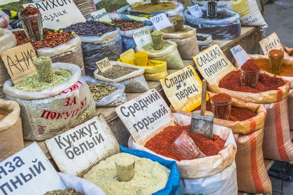 Vivid oriental central asian market with bags full of various sp — Stock Photo, Image