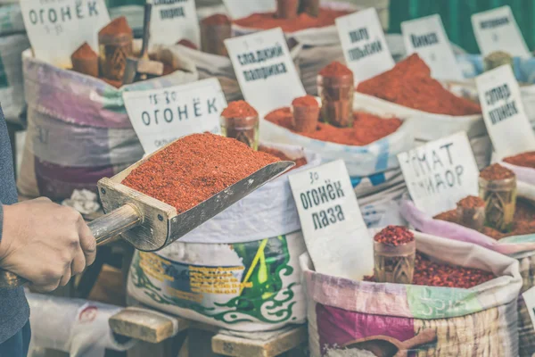 Vivid oriental central asian market with bags full of various sp — Stock Photo, Image