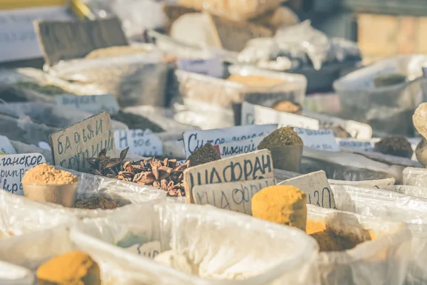 Vivid oriental central asian market with bags full of various sp — Stock Photo, Image