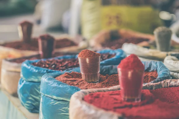 Vivid oriental central asian market with bags full of various sp — Stock Photo, Image