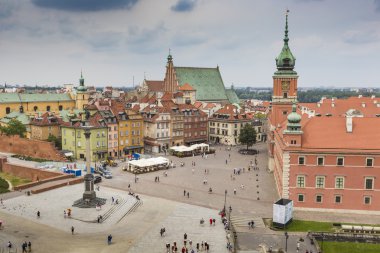 Old town in Warsaw, Poland. The Royal Castle and Sigismund's Col clipart
