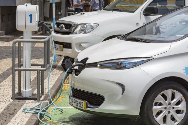 Cable hanging down from gas tank location on electrical vehicle. — Stock Photo, Image