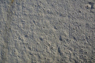 Kirli gri beton duvar arkaplanının soyut dokusu.