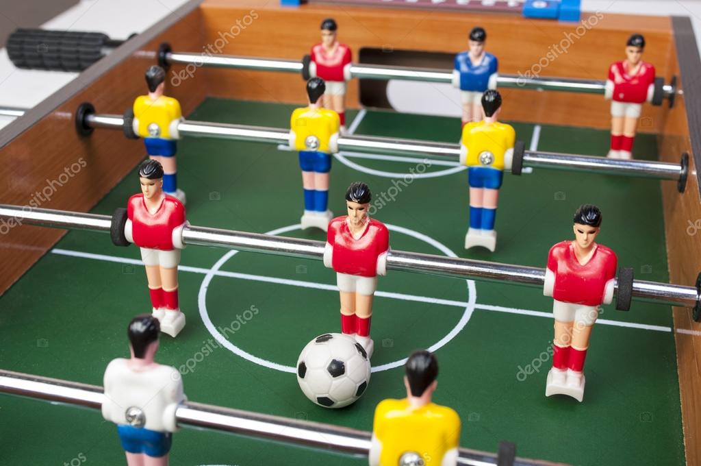 Playing toy football players Stock Photo by ©kreatorex 62346845