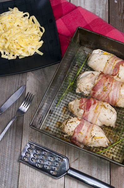 Chicken breast wrapped in ham — Stock Photo, Image